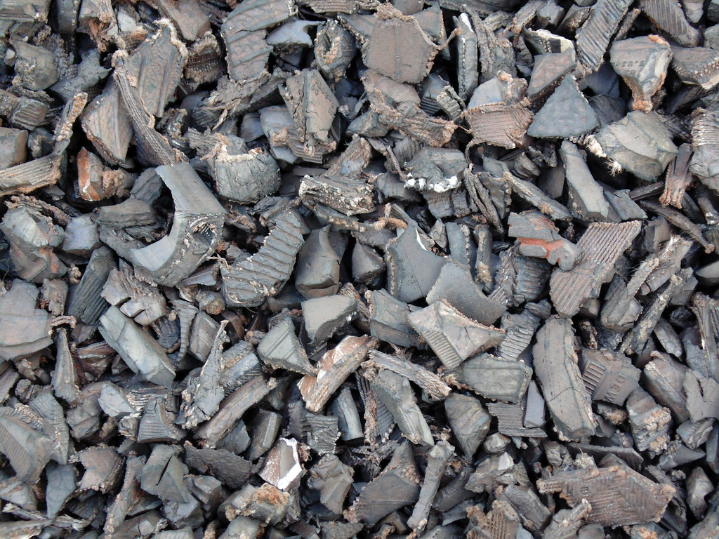 Shredded tire chips ready to be processed into tire-derived fuel and crumb rubber
